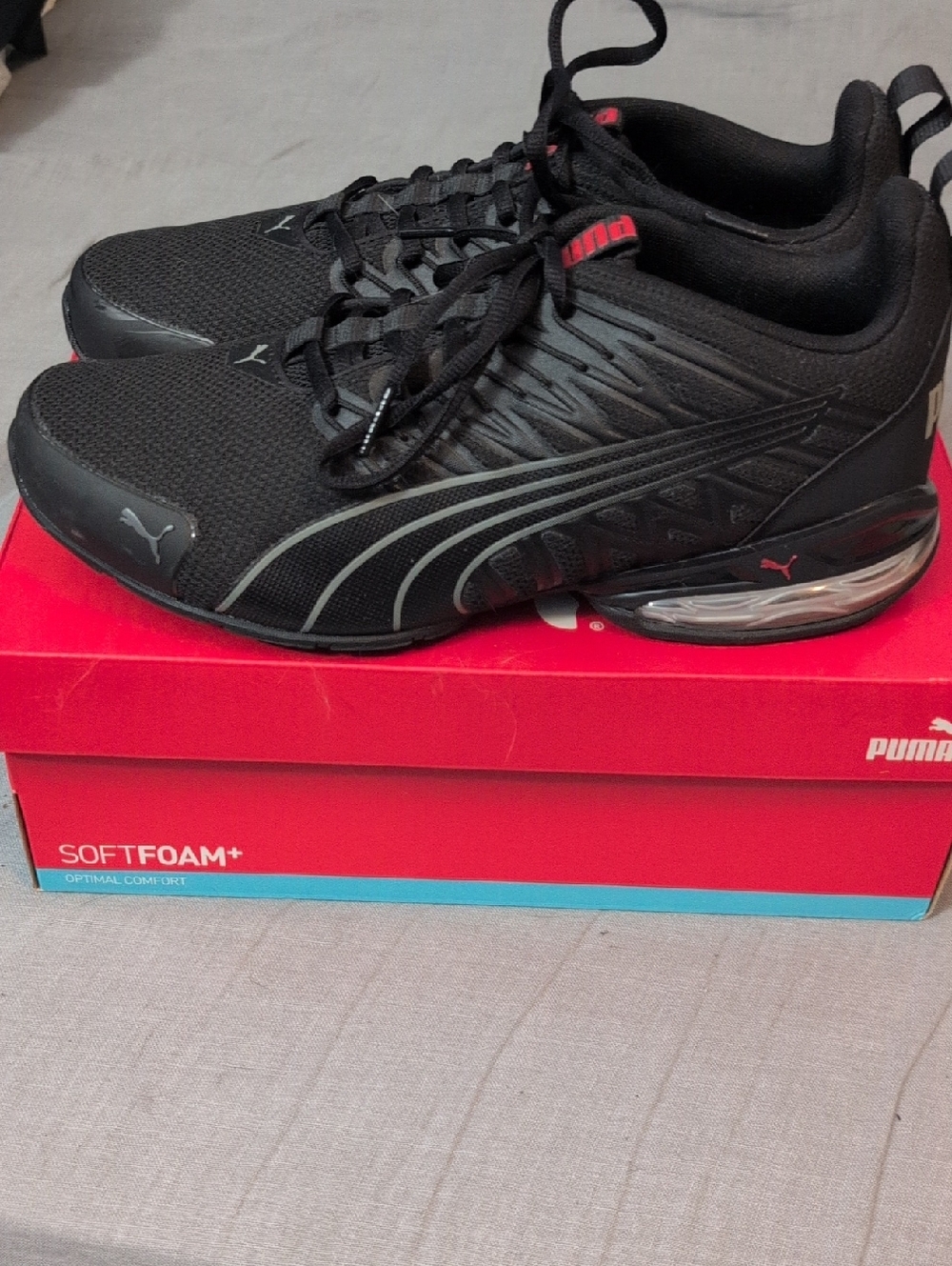 Puma Black Sneakers with Red Accents